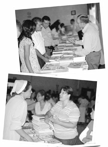 Two views of people browsing and discussing books at a convention