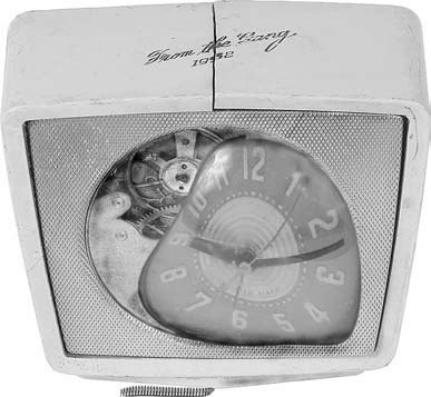 An old broken clock with a distorted face