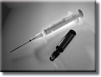 Illustration of a syringe and dropper administering an inoculation