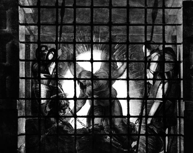 A prisoner behind bars with an angel beside him