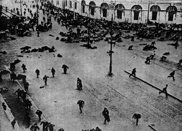 People scattered across a city square