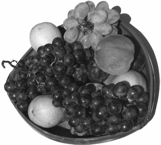 Bowl of fruit with grapes and other fruit