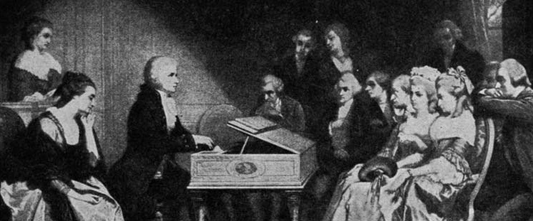 A seated man playing a keyboard instrument for a gathering