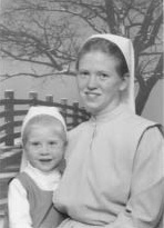 Shannon Hamby holding her daughter.