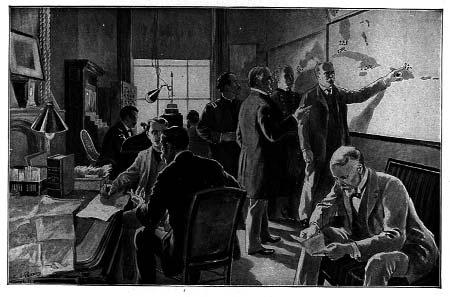 Men in a military planning room, with a man pointing to a wall map
