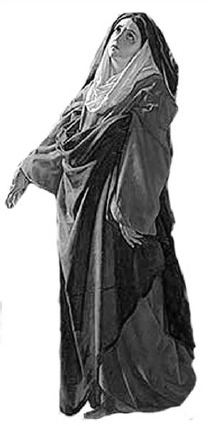 A woman wearing a long layered garment