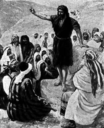 A man addressing a gathered crowd