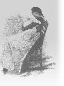 A seated mother holding a child