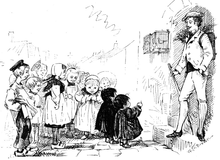 Children face a man standing beside a hanging bird cage