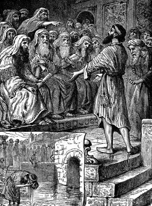 A man speaking before a seated gathering