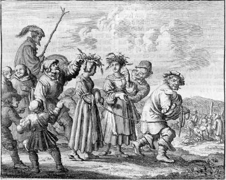 An engraving of two women wearing wreaths being led through a crowd.