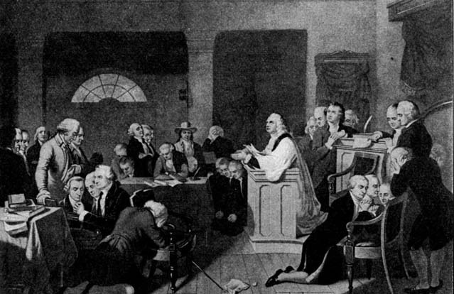 Men gathered in an assembly room
