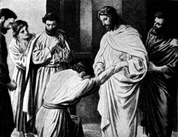 Jesus speaking with a kneeling man