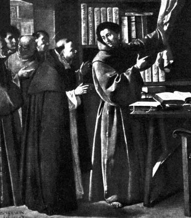 Men gathered around a desk