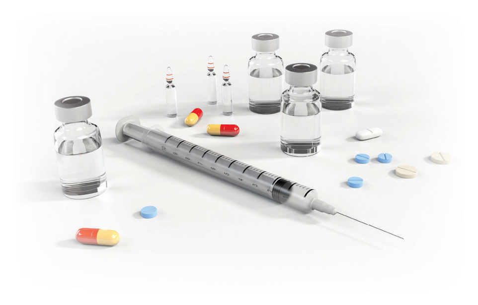 Vaccine vials, a syringe, capsules, and tablets