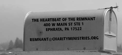 A roadside mailbox bearing the magazine’s mailing address