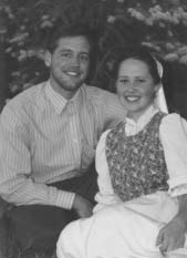Andrew and Elisabeth Weaver seated together.
