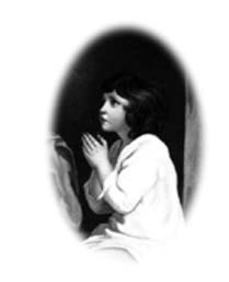 A child kneeling with hands together in prayer.