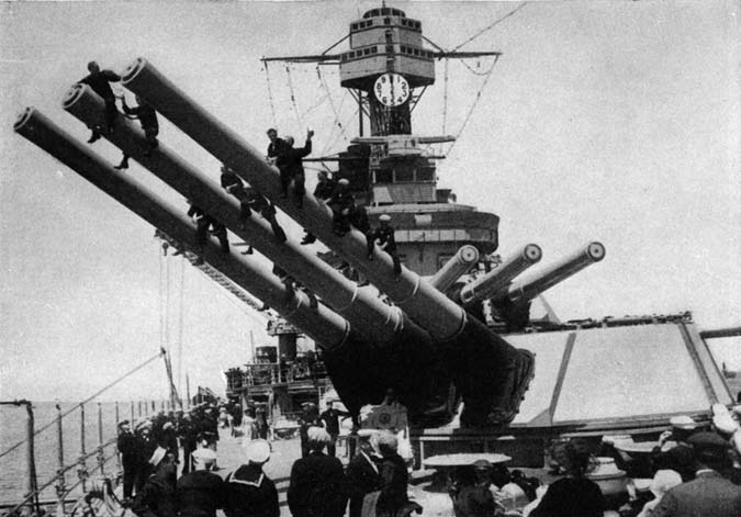 Large naval guns on the deck of a battleship