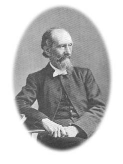 Andrew Murray seated in a chair.