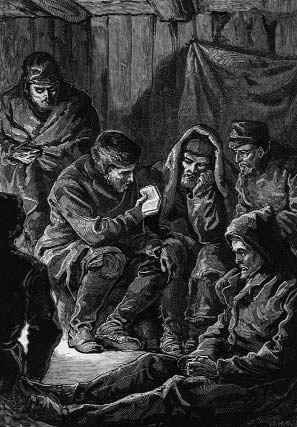 A group of people gathers in a dim interior