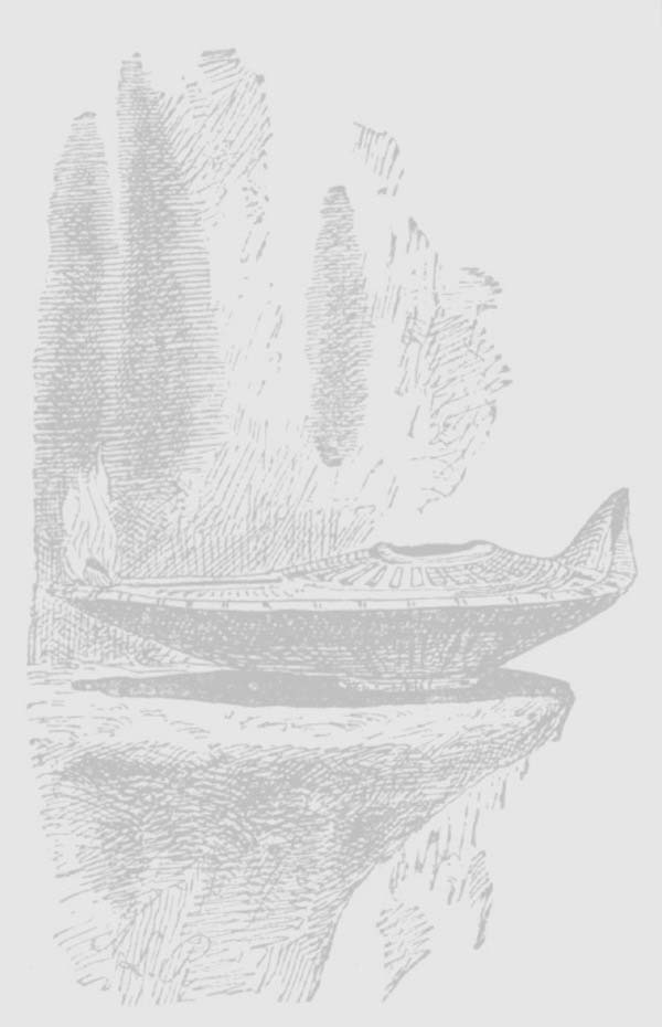 An oil lamp beside a rough wall