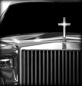 Luxury car grille with a cross on the hood