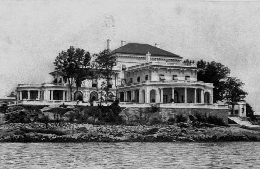 A large mansion beside the water