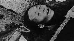A reclining person with closed eyes
