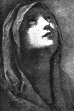Portrait of a woman wearing a head covering