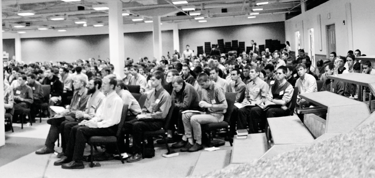 A second view of Bible School attendees seated in the hall