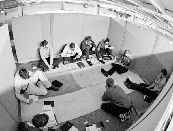 Students seated in a Bible School prayer group