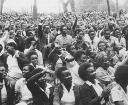 Crowd gathered at an outdoor religious meeting