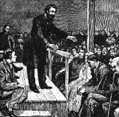 A preacher addressing a seated congregation