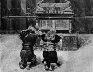 Two figures kneeling before an ark with winged figures