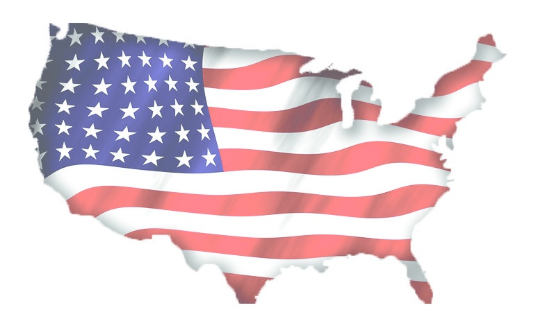 Outline of the United States filled with a waving American flag