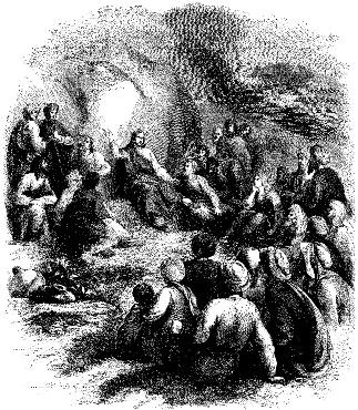 A preacher speaks to a crowd beneath a large tree.