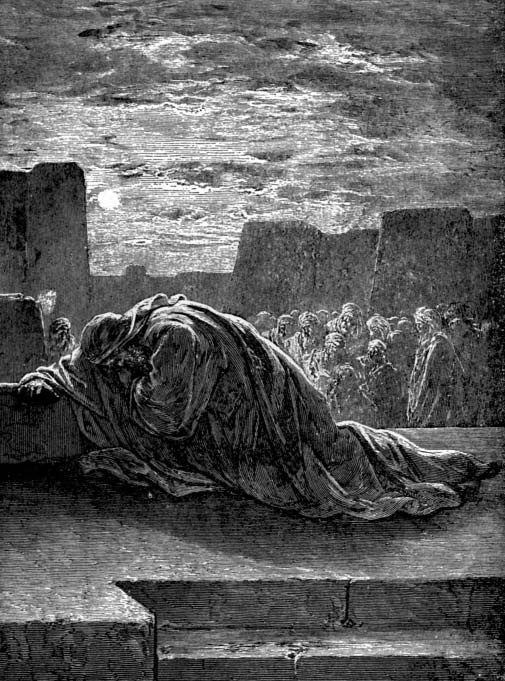 A robed man bows low on a stone platform with people behind him.