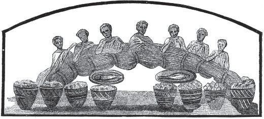People gathered around a table with vessels