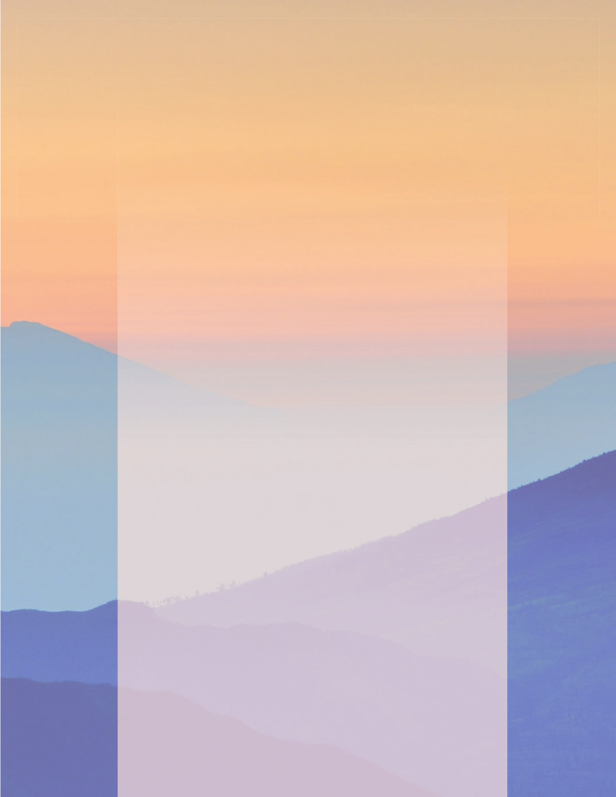 Layered blue mountains beneath a warm peach-colored sky