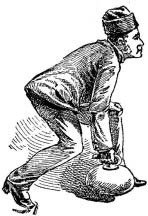 A man bending forward with his hands on a large stone.