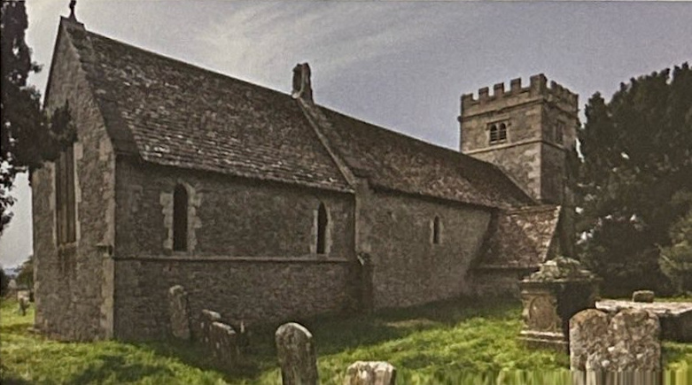 A stone church with a square tower stands beside old gravestones.