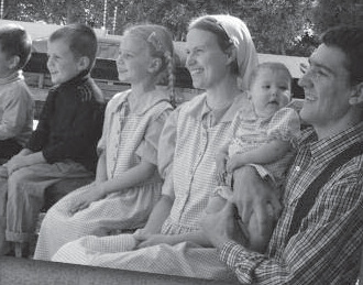 Seated van der Merwe family with children