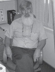 Jaco van der Merwe seated indoors