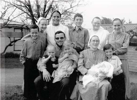 The Hoover family gathered outdoors