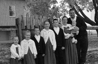 Dean and Tania Taylor with their family outdoors