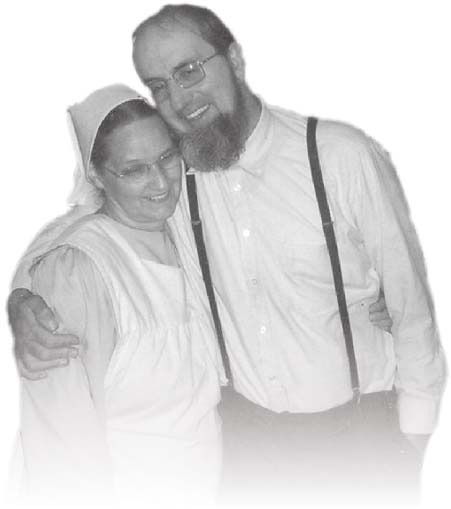 Two adults standing together.