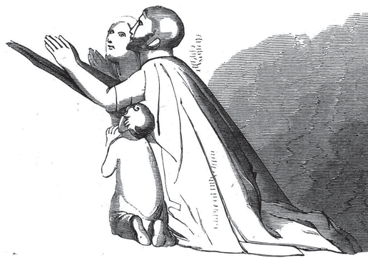A parent kneels to pray with two children