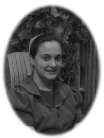 An oval portrait of a young woman.