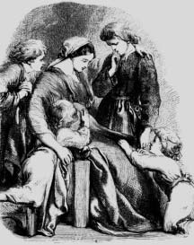 Women gathered around a seated woman.